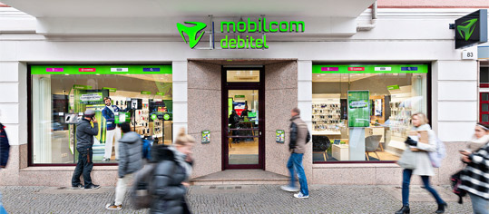 mobilcom-debitel-Shop in einer Einkaufsstraße.